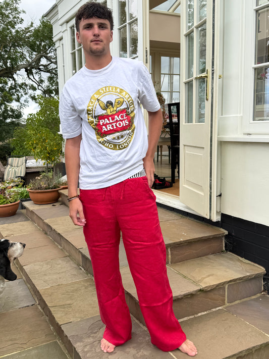 Red linen trousers with out trademark stripe waistband