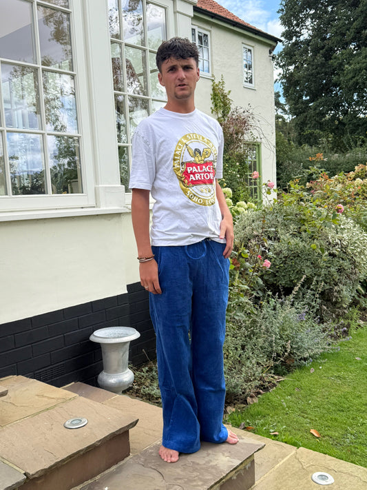 Bright blue cords with trademark stripe waistband