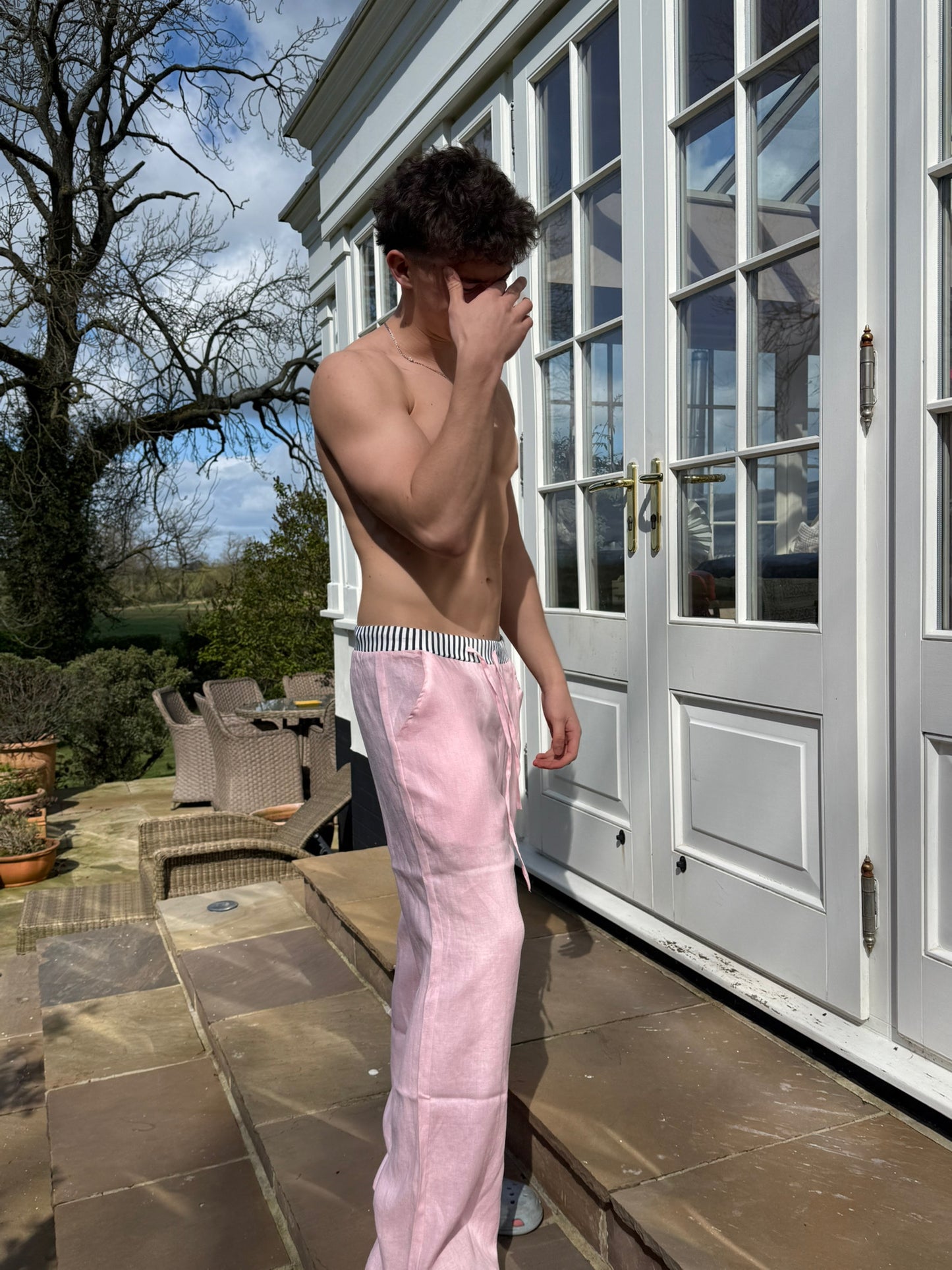 100%linen pink trousers with trademark stripe waistband