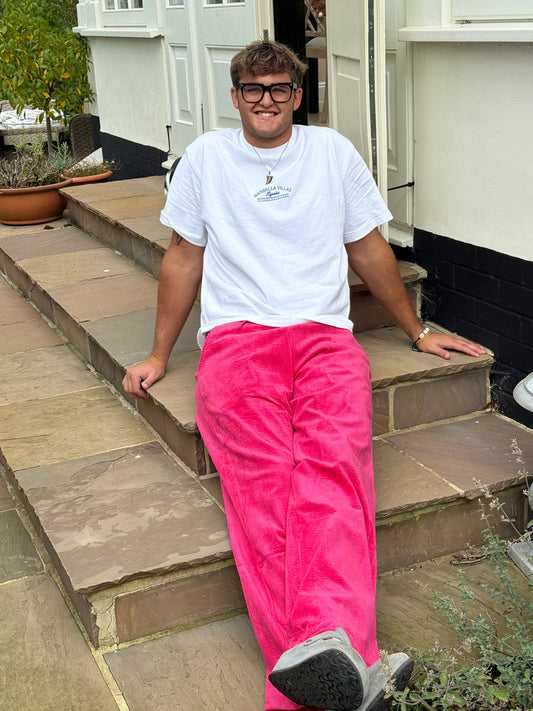 Hot pink cords with trademark stripe waistband