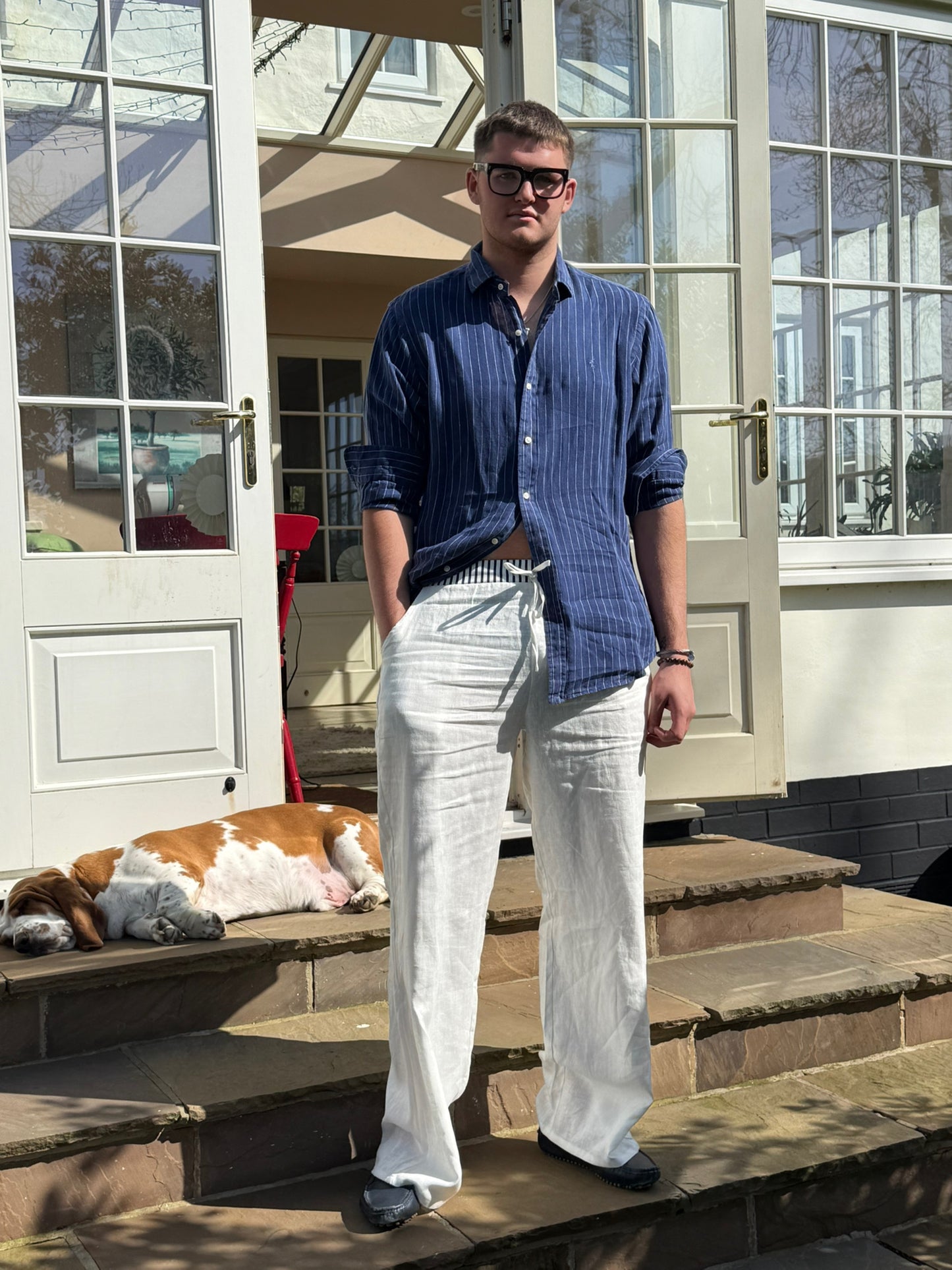 White 100% linen loose trousers with our trademark stripe waistband